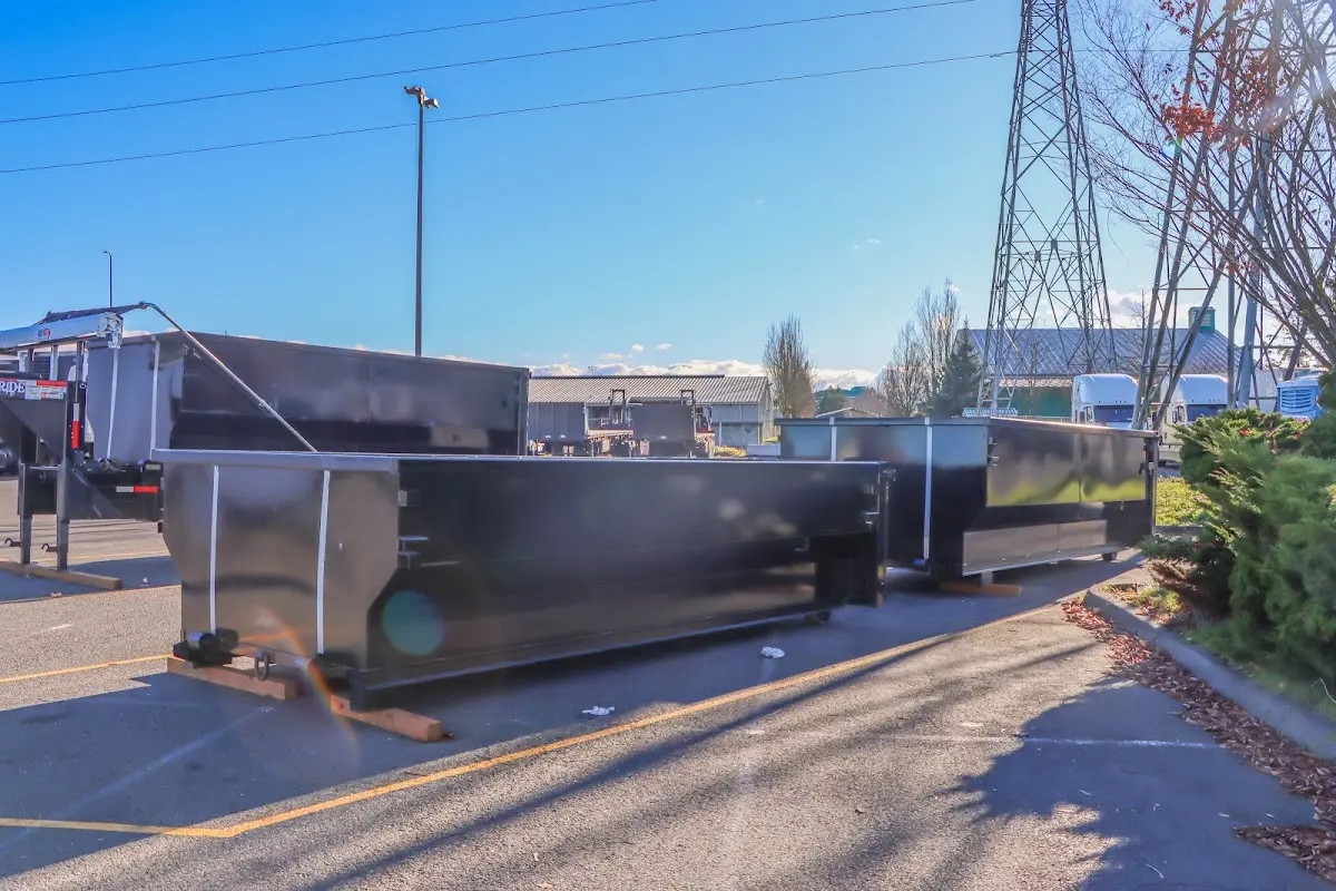 Roll-off dumpster ready for waste disposal at job site for Yard Waste Dumpster Rental in Seekonk